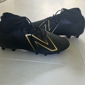 New Balance Tekela Black and Gold Soccer Cleats